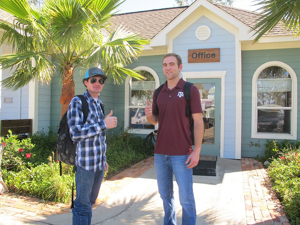 Two UAG residents outside the leasing office