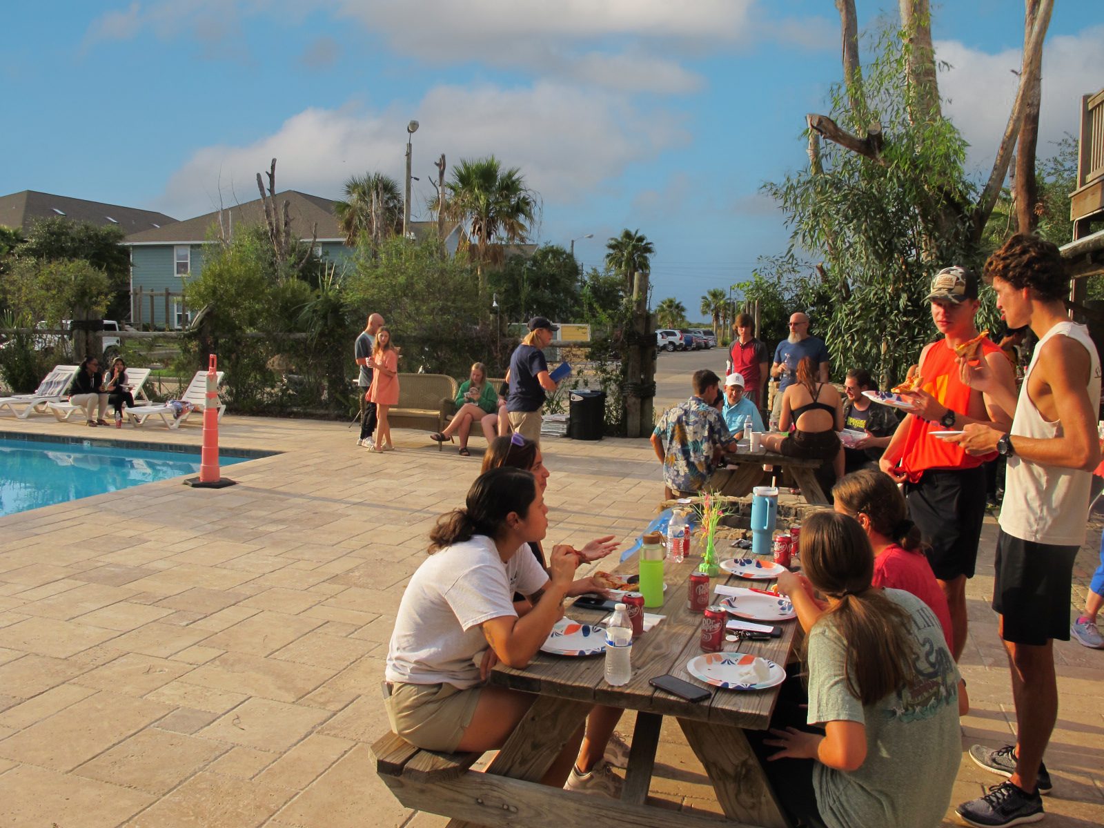 Residents gathered at an outdoor UAG community event