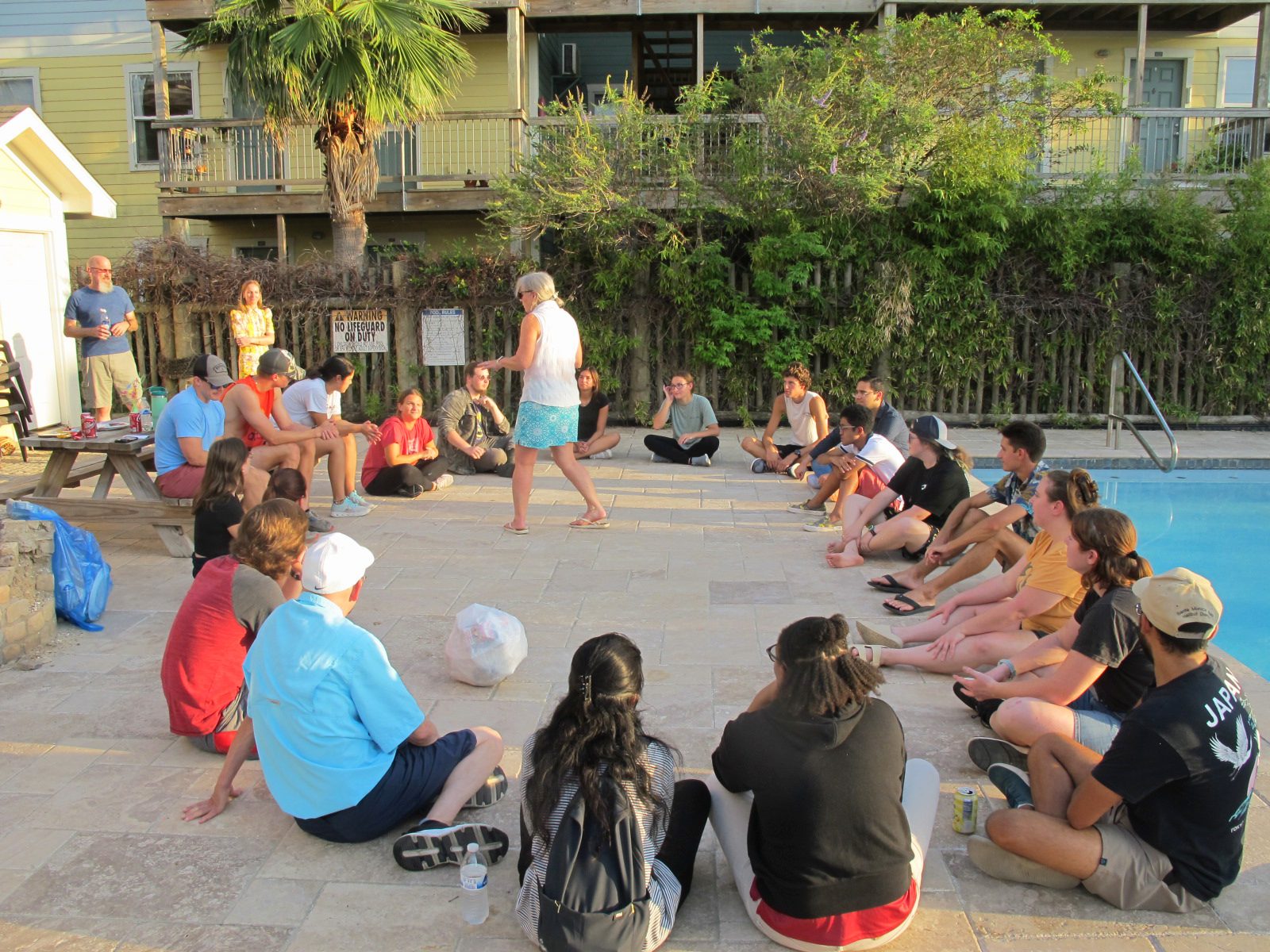 Residents seated together during a UAG community event